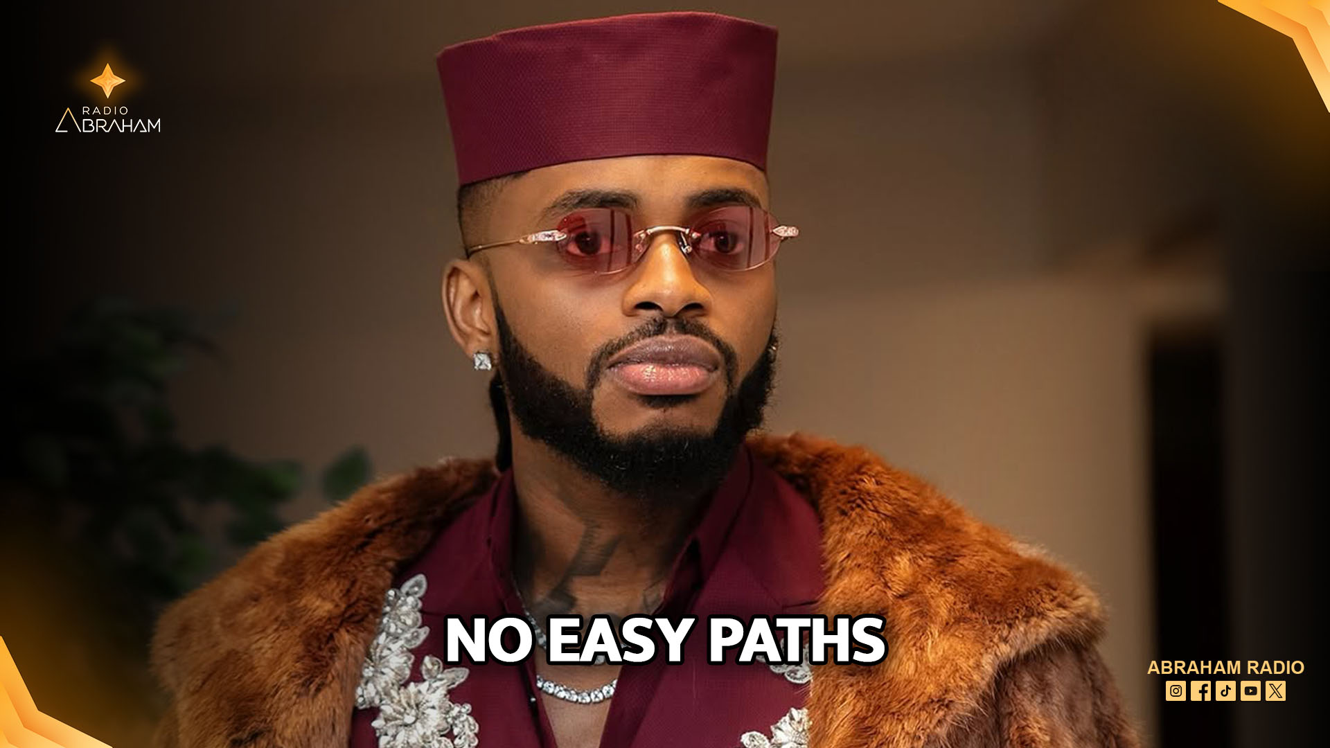 Recording artist Diamond Platnumz backstage, speaking about international collaborations and cultural exchange.